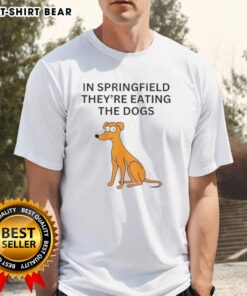 Alt Text: Funny 'Nice In Springfield They're Eating The Dogs' T-Shirt design featuring a playful graphic and bold text.