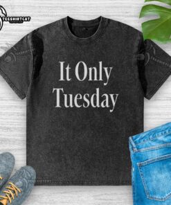 Nice It Only Tuesday washed t-shirt displayed on a hanger, featuring a soft fabric and casual design for everyday wear.