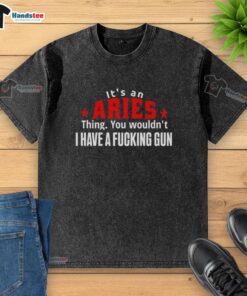 Funny Aries T-shirt with 'It's an Aries thing, you wouldn't understand' and a graphic of a gun design.