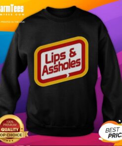Trendy 'Nice Lips and Assholes' sweatshirt featuring bold graphic design, perfect for casual fashion enthusiasts.