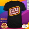 Funny 'Nice Lips And Assholes' T-Shirt featuring bold graphics ideal for casual wear and humor lovers.
