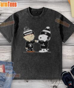 Nice Los Angeles Raiders Snoopy and Charlie Brown Best Friends washed t-shirt featuring iconic cartoon characters.