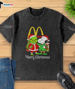 Alt Text: Nice McDonald's X Grinch and Snoopy Merry Christmas washed t-shirt featuring festive graphics and vibrant colors.
