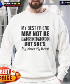 Cozy sweatshirt featuring a heartfelt quote: 'My best friend may not be my sister by blood, but she's my sister by heart.'