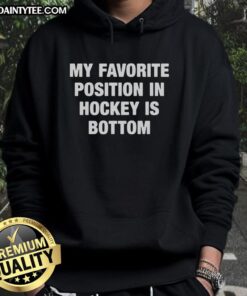 Comfortable 'My Favorite Position in Hockey is Bottom' hoodie, perfect for hockey fans showcasing their passion.