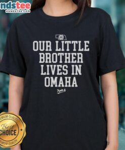Nice Nebraska Rivalry tee featuring 'Our Little Brother Lives in Omaha' design, perfect for fans celebrating local sports.