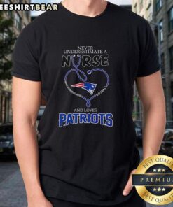 Nice Never Underestimate A Nurse and Loves New England Patriots T-Shirt featuring bold graphics and vibrant colors.
