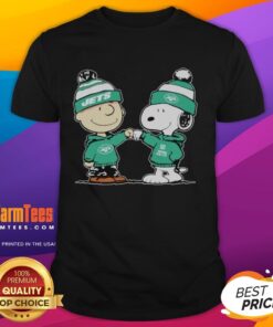 Alt Text: New York Jets Snoopy and Charlie Brown best friends T-shirt featuring playful graphics and vibrant colors.