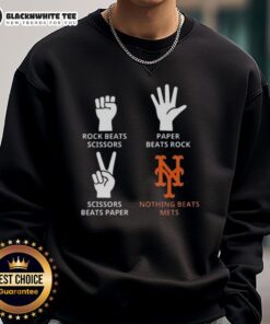 Alt Text: Cozy New York Mets sweatshirt featuring 'Nothing Beats Rock, Paper, Scissors' design, perfect for fans.