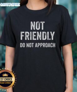 Funny ladies tee with 'Nice, Not Friendly, Do Not Approach' quote for a humorous touch to casual outfits.
