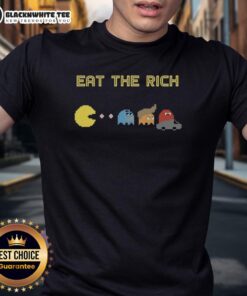 Alt Text: Nice Pacman Eat The Rich T-Shirt featuring a playful Pacman graphic and bold text for a fun, trendy look.