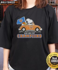 Alt Text: Cute Snoopy driving a car on a New York Knicks ladies tee celebrating the 2025 NBA Cup Champions.