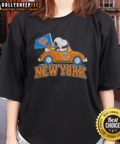 Snoopy driving a car in New York Knicks basketball ladies tee featuring nice peanuts design.