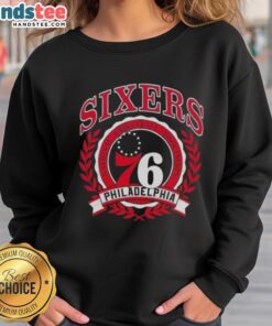 Alt Text: Cozy Philadelphia 76ers sweatshirt showcasing the National Basketball Association crest, perfect for fans and casual wear.