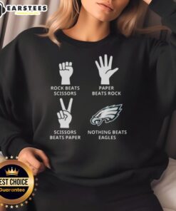 Nice Philadelphia Eagles sweatshirt featuring 'Nothing Beats Rock, Paper, Scissors' design for fans and gamers.