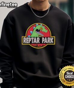 Nice Reptar Park Rugrats Movie cartoon sweatshirt featuring vibrant colors and iconic character design for fans.