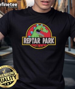 Nice Reptar Park Rugrats Movie Cartoon T-Shirt featuring colorful Reptar design, perfect for nostalgic fans of the classic series.