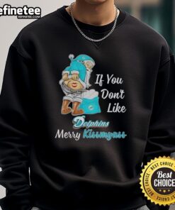 Funny Santa Claus sweatshirt for Miami Dolphins fans: 'Merry Kiss My Ass' design perfect for holiday cheer.