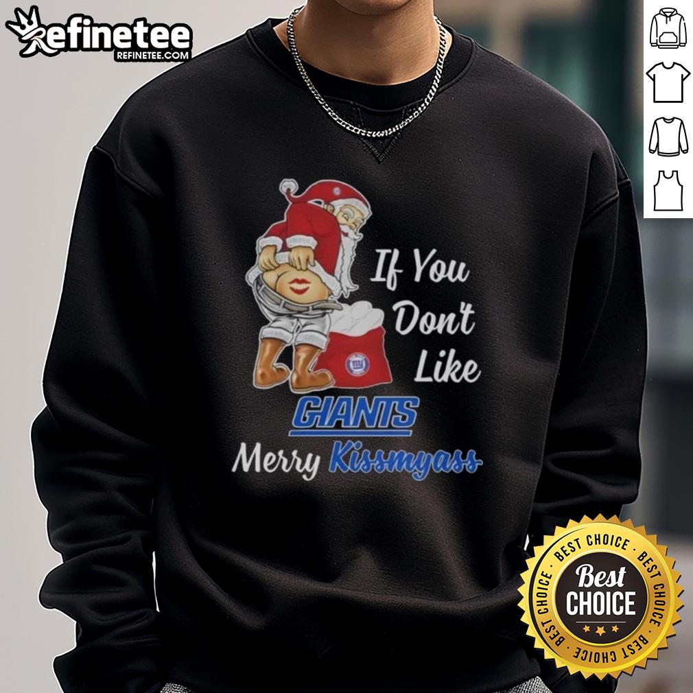 nice-santa-claus-if-you-dont-like-new-york-giant-merry-kissmyass-sweatshirt Santa Claus wearing a funny sweatshirt saying 'If You Don't Like New York Giants, Merry Kissmyass' for holiday cheer.