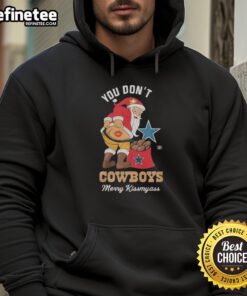 Santa wearing a humorous 'Kiss My Ass' hoodie, perfect for Dallas Cowboys fans celebrating Christmas.