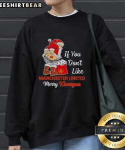 Funny sweatshirt featuring 'Merry Kissmyass' design for fans who don't like Manchester United. Perfect for holiday cheer!