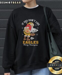 Funny Christmas sweatshirt for Eagles fans: 'Merry Kiss My Ass' design featuring Santa in Philadelphia Eagles colors.