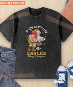 Funny Christmas t-shirt featuring Santa with 'If you don't like Philadelphia Eagles, Merry Kiss My Ass' slogan.