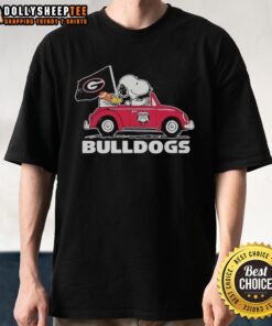 Alt Text: Snoopy and Woodstock in a Georgia Bulldogs car t-shirt, showcasing a fun, sporty design for fans.