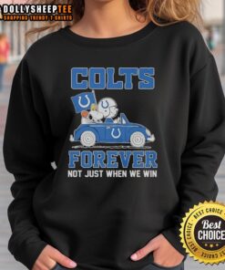 Snoopy and Woodstock riding an Indianapolis Colts car on a sweatshirt, celebrating fandom year-round.