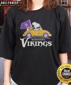 Snoopy and Woodstock riding a Minnesota Vikings football car logo on a ladies' tee shirt, perfect for fans.
