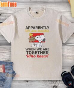 Alt Text: Funny Snoopy graphic on a washed t-shirt with the quote 'Apparently We Are Trouble When We Are Together'.