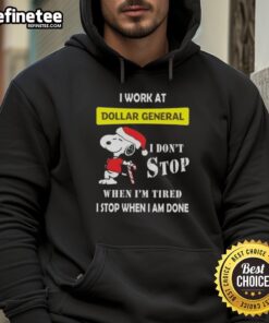 Alt Text: Christmas hoodie featuring Snoopy and the phrase 'I work at Dollar General, I don't stop when I'm tired, I stop when I'm done.'