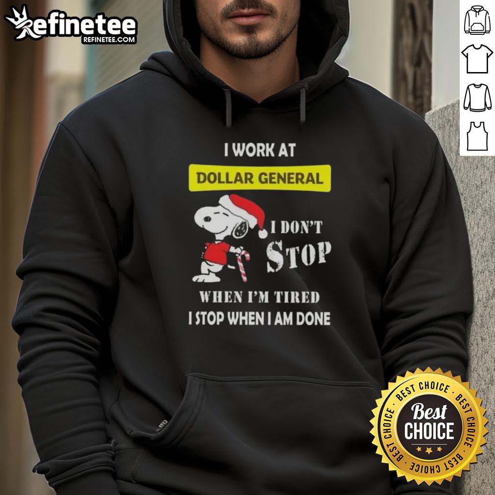 nice-snoopy-i-work-at-dollar-general-i-dont-stop-when-im-tired-i-stop-when-i-am-done-christmas-hoodie Alt Text: Christmas hoodie featuring Snoopy and the phrase 'I work at Dollar General, I don't stop when I'm tired, I stop when I'm done.'