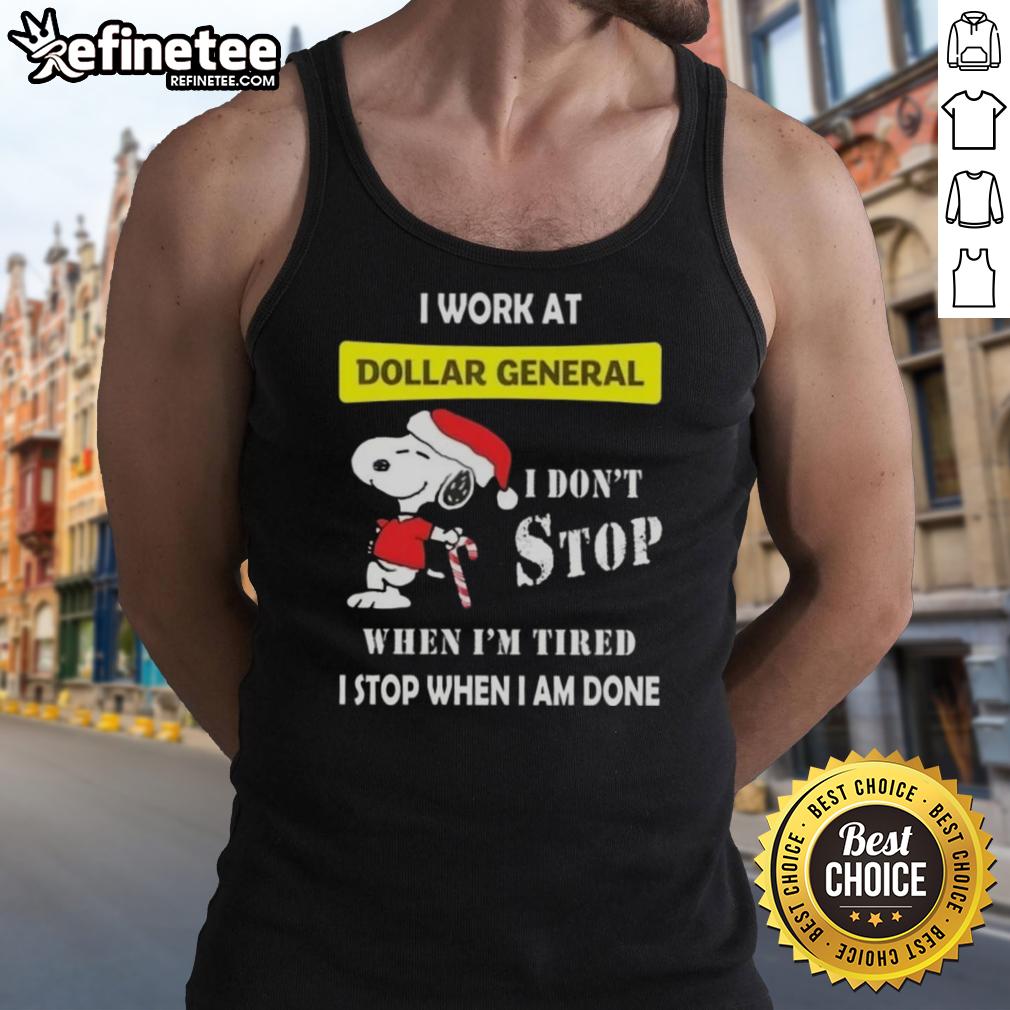 nice-snoopy-i-work-at-dollar-general-i-dont-stop-when-im-tired-i-stop-when-i-am-done-christmas-tank-top Alt Text: Snoopy Christmas tank top with the phrase 'I work at Dollar General, I dont stop when Im tired, I stop when Im done.'