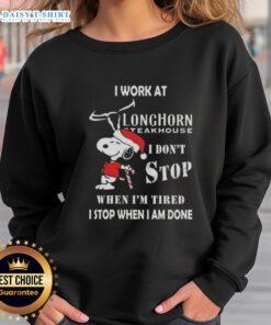 Snoopy Christmas sweatshirt for Longhorn Steakhouse featuring 'I don't stop when I'm tired, I stop when I'm done' quote.