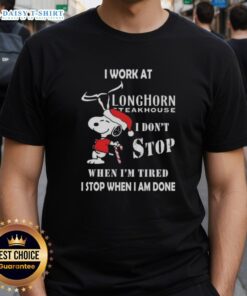 Funny Snoopy graphic on Christmas T-shirt for Longhorn Steakhouse, saying 'I dont stop when Im tired, I stop when Im done.'