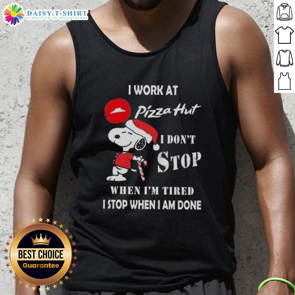Nice Snoopy I Work At Pizza Hut I Don't Stop When I'm Tired I Stop When I Am Done Christmas Tank Top Alt Text: Snoopy wearing a Christmas tank top with the phrase I work at Pizza Hut, I don't stop when I'm tired printed.