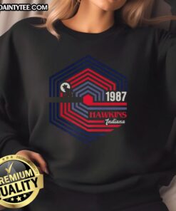 Alt Text: Hawkins, Indiana 1987 Demogorgon logo sweatshirt inspired by Stranger Things series.
