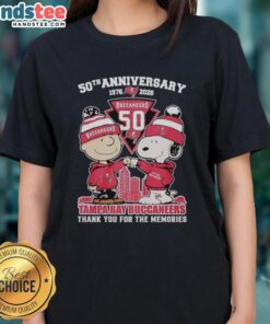 Stylish Tampa Bay Buccaneers outfit featuring Snoopy and Charlie Brown 50th Anniversary tee for ladies, 1976-2026.