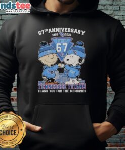 Stylish Tennessee Titans outfit featuring a Snoopy and Charlie Brown hoodie, celebrating their 67th anniversary (1959-2026).