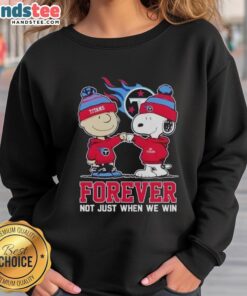 Alt Text: Nice Tennessee Titans x Charlie Brown sweatshirt featuring Snoopy with 'Forever, Not Just When We Win' slogan.