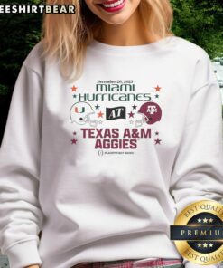 Alt Text: 2025 CFP First Round Matchup sweatshirt featuring Nice Texas A&M Aggies and Miami Hurricanes logos.