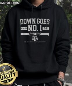 Texas A&M volleyball team celebrates victory over No. 1 ranked opponent, showcasing 'Down Goes No. 1' hoodie.