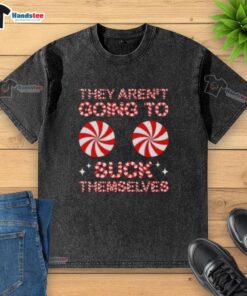 Funny Christmas washed t-shirt featuring 'Nice, They Aren't Going to Suck Themselves' candy design for holiday cheer.