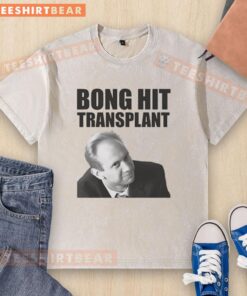 Thomas Myers enjoying a bong hit in a washed t-shirt, showcasing a relaxed vibe in a vibrant portrait.