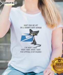 Grumpy USPS woman in a 'Nice Tired Cat' tee, exuding attitude with a playful message about doing what she wants.