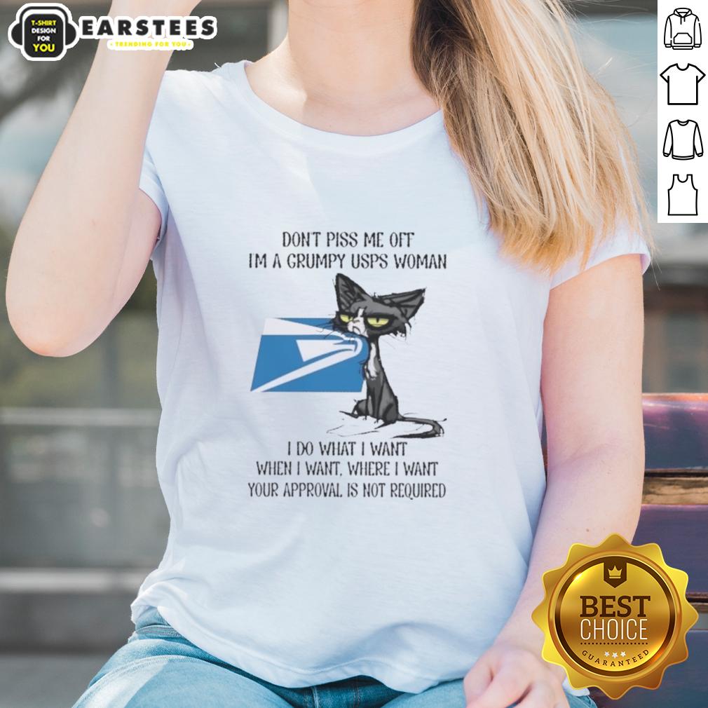 nice-tired-cat-dont-piss-me-off-im-a-grumpy-usps-woman-i-do-what-i-want-when-i-want-ladies-tee Grumpy USPS woman in a 'Nice Tired Cat' tee, exuding attitude with a playful message about doing what she wants.