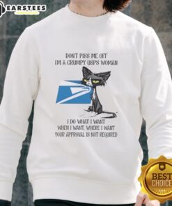 Grumpy USPS woman wearing a 'Nice Tired Cat' sweatshirt, showcasing a humorous take on postal service frustrations.
