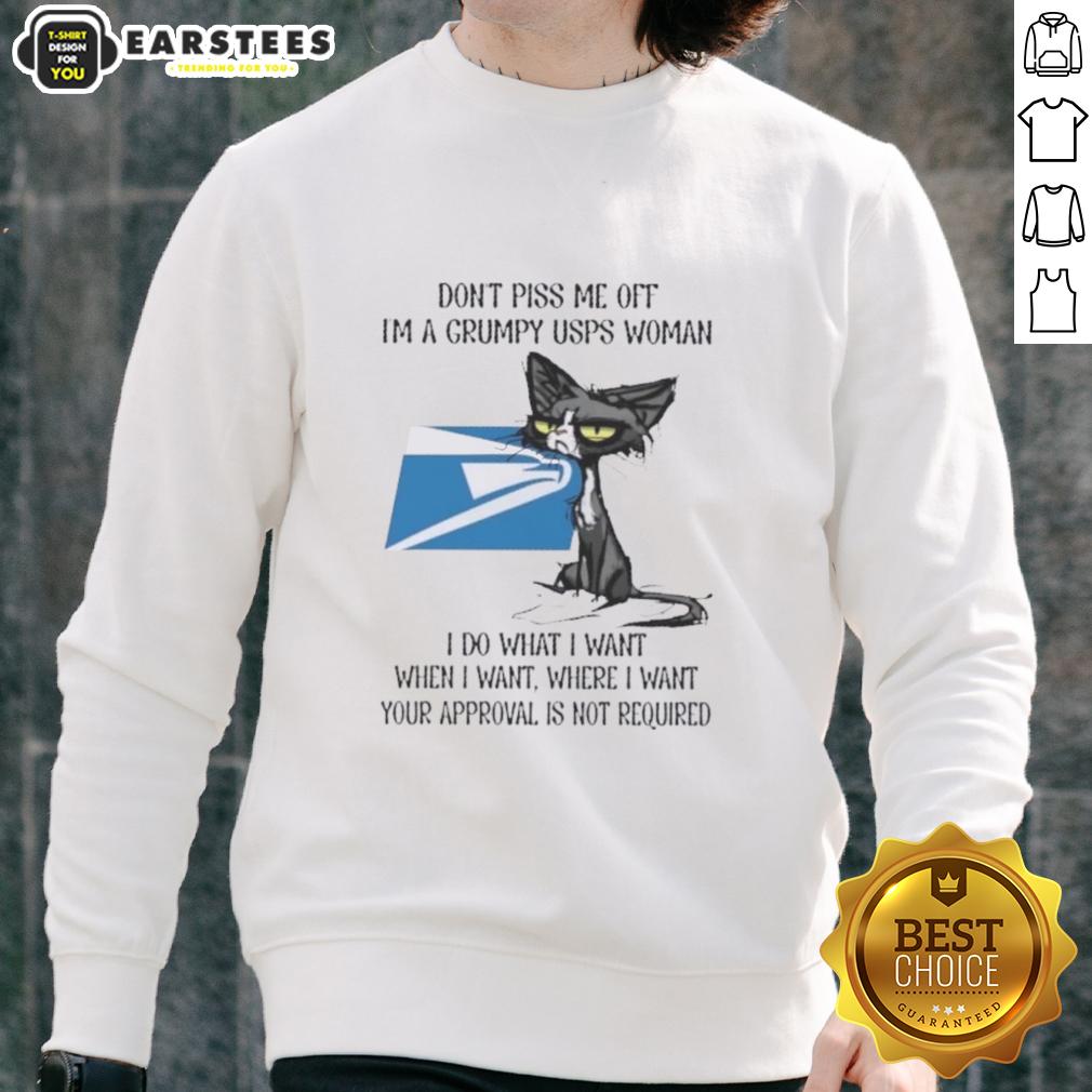 nice-tired-cat-dont-piss-me-off-im-a-grumpy-usps-woman-i-do-what-i-want-when-i-want-sweatshirt Grumpy USPS woman wearing a 'Nice Tired Cat' sweatshirt, showcasing a humorous take on postal service frustrations.