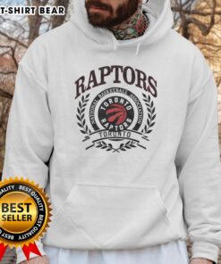 Alt Text: Retro hoodie featuring the Toronto Raptors NBA logo framed by a laurel wreath for stylish basketball fans.